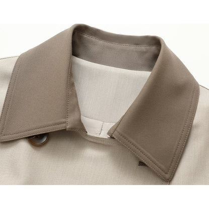 Trench-coat mi-long à ceinture et motif de couleurs contrastantes