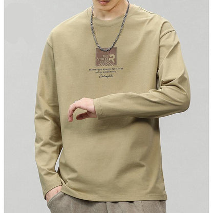 Camiseta de manga larga con cuello redondo y estampado de simplicidad en algodón puro.