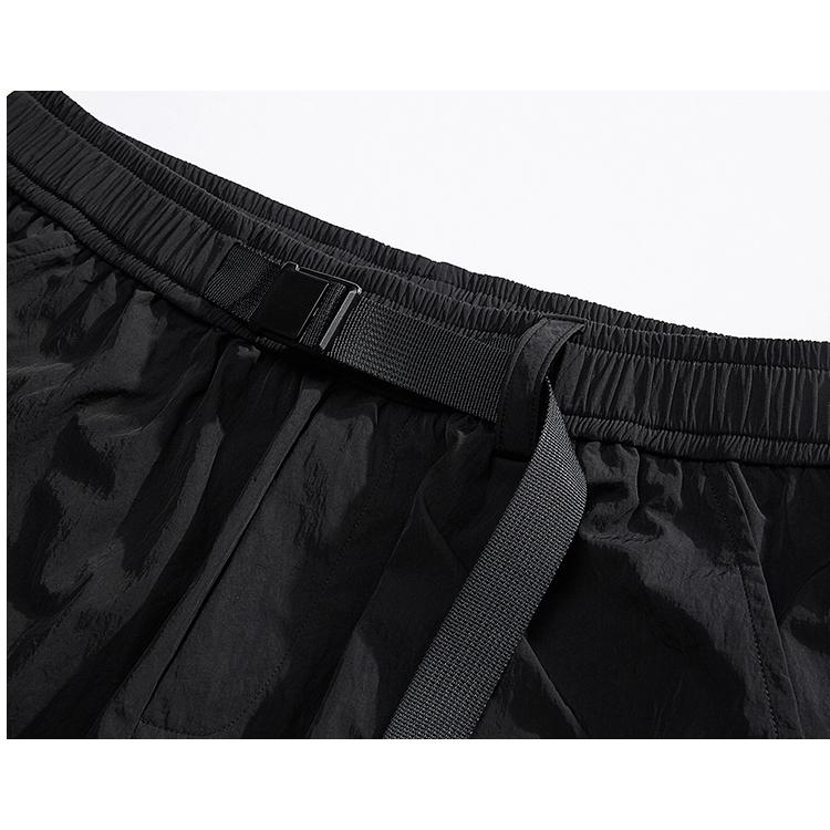 Pantalones cargo con ajuste holgado, dobladillo ajustable con cordón y cintura elástica.