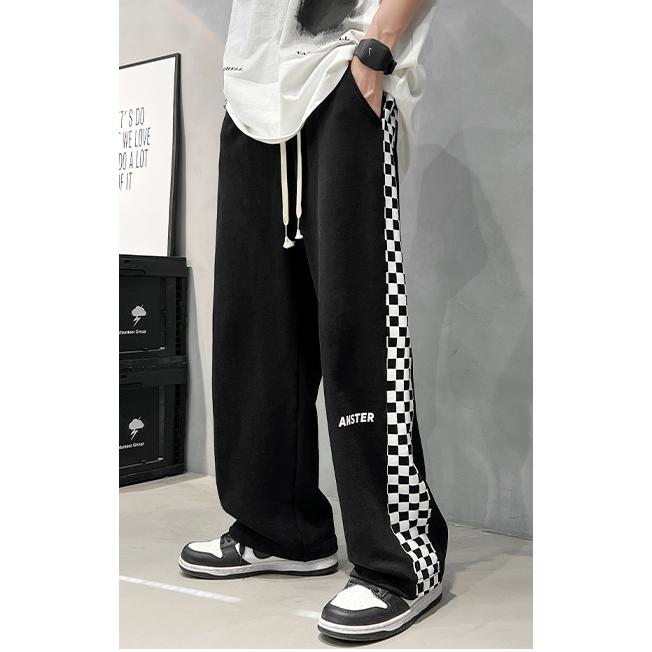 Pantalon de survêtement ample et ajusté au style urbain tricoté pour le sport.