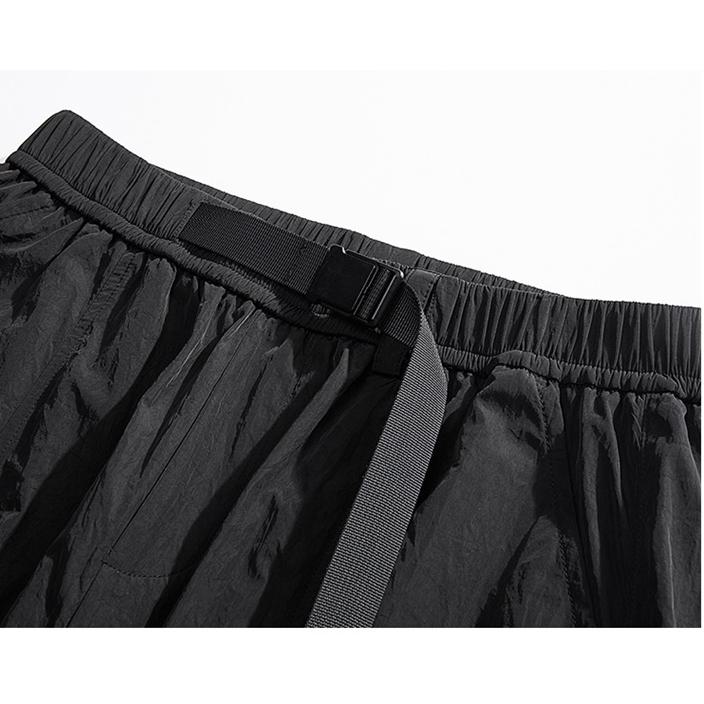 Pantalones cargo sueltos con cordón elástico en el dobladillo y bolsillos fuelle