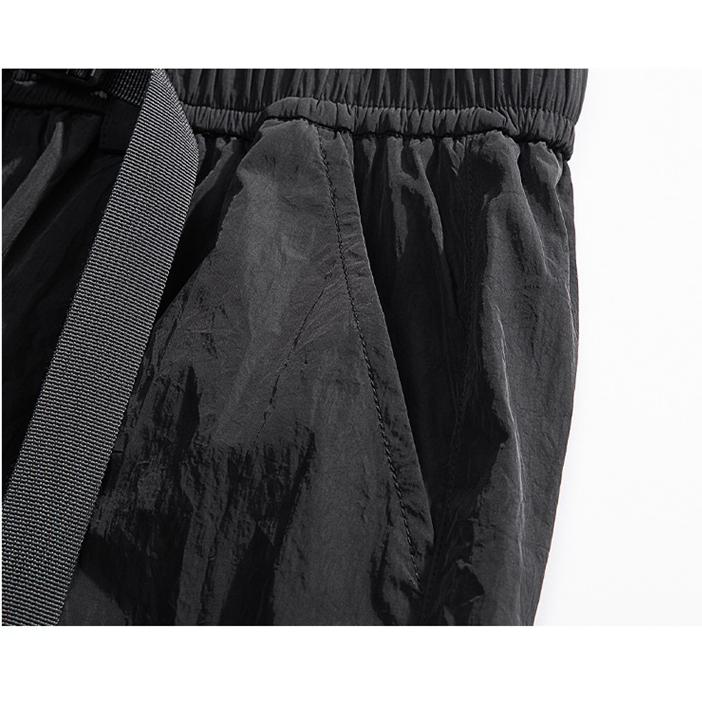 Pantalones cargo sueltos con cordón elástico en el dobladillo y bolsillos fuelle