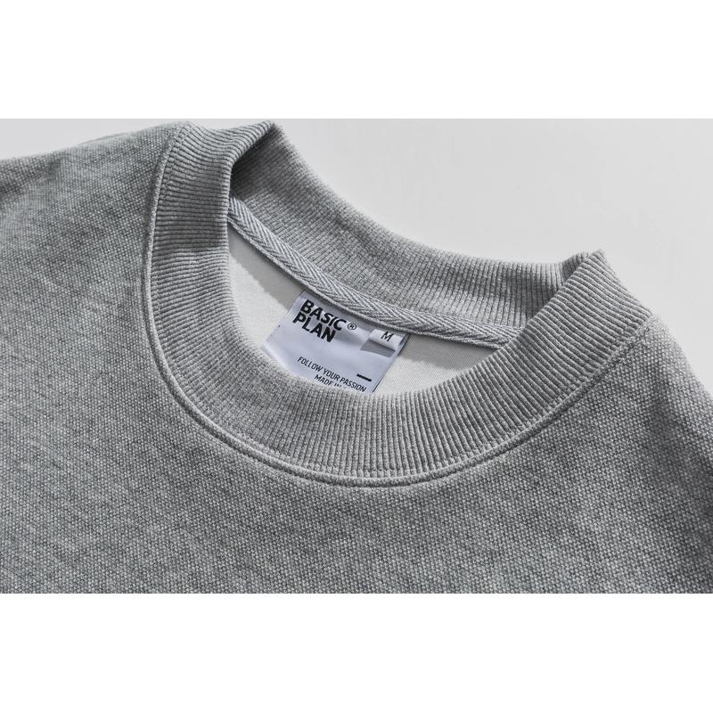 Sweatshirt col rond à rayures avec impression en coton faux épais et velours anti-boulochage.