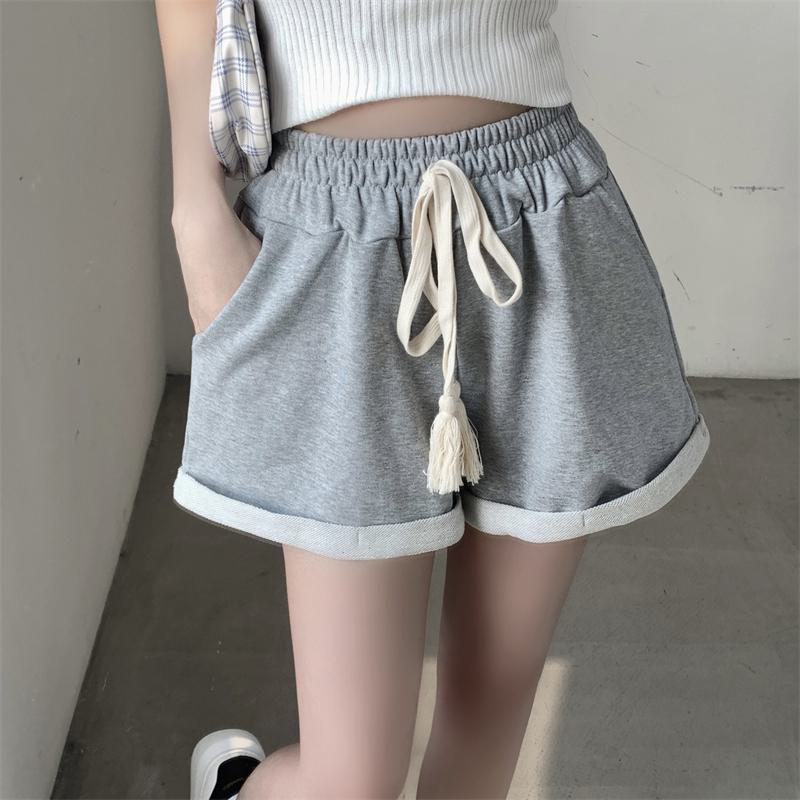 Shorts larges en coton à cordon de serrage et poches, à la mode
