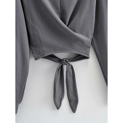 Tee-shirt à manches longues avec nœud papillon croisé, en coton, col rond.