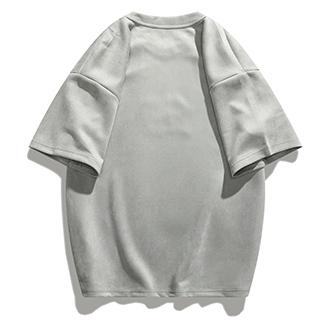 Camiseta de manga corta de cuello redondo y estampado elástico de gamuza con hombros caídos y corte holgado