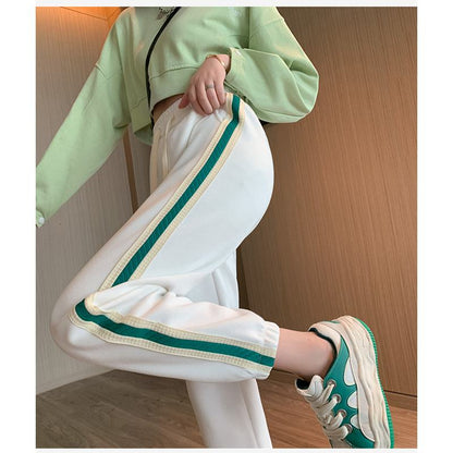 Pantalones de deporte rectos de ajuste holgado y adelgazantes para tallas grandes.