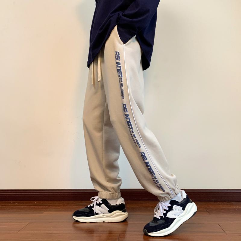 Pantalón deportivo de punto con cordón y corte amplio y cónico