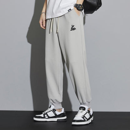 Pantalon de sport tendance ample et ajusté en tricot