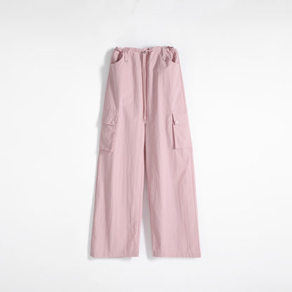 Pantalones anchos informales de estilo callejero con cintura ajustable y cordón deportivo.