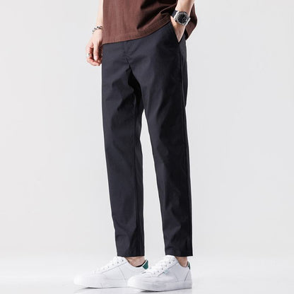 Pantalon polyvalent à la taille élastique, style preppy, ajusté et tendance