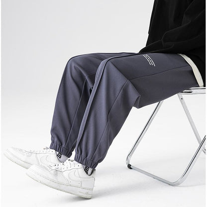 Pantalones de punto casuales con cordón ajustable, estilo informal y ajuste holgado para deportes.