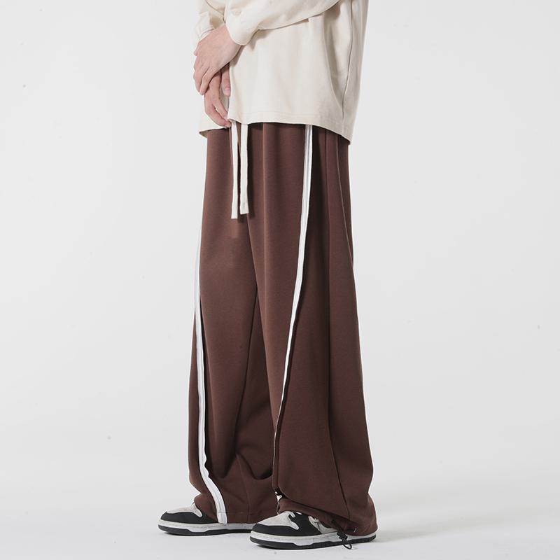 Pantalón de chándal con cordón ajustable y corte cónico tejido