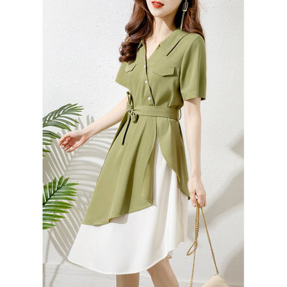 فستان أخضر بتصميم أنيق وغير منتظم وخصر مشدود بنقشة الأفوكادو.