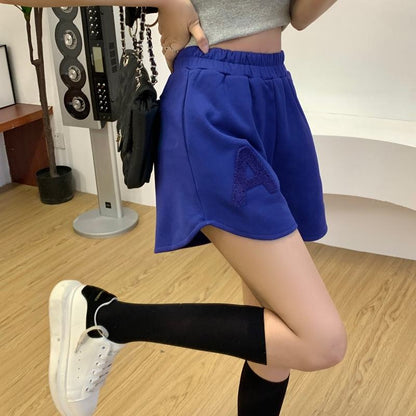Vielseitige lockere Shorts aus Kunstbaumwolle in kontrastierenden Farben