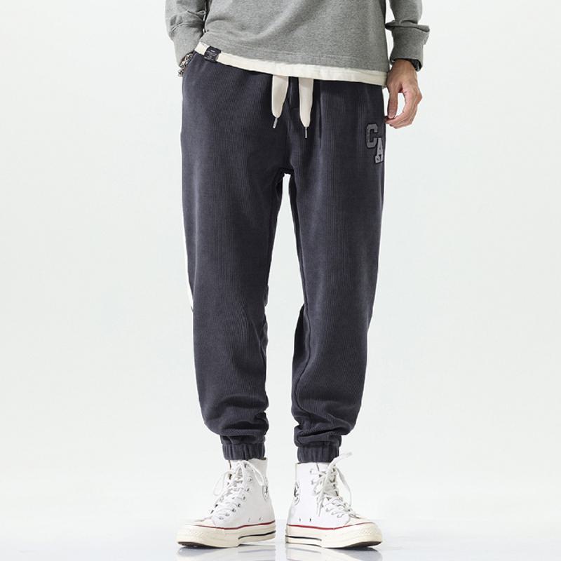 Elastische, vielseitige Sweatpants mit lockerer Passform und Patchwork-Design