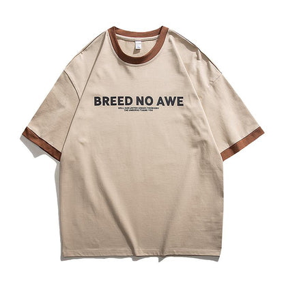 Bequemes, weiches Fake-Two-Piece-Baumwoll-T-Shirt mit kurzem Rundhalsausschnitt.