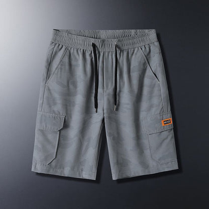 Shorts décontractés minces à taille à cordon, poches à rabat, et motif camouflage tendance au travail.
