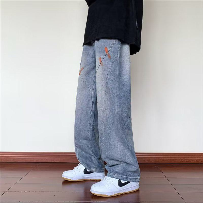 Jeans retro de patchwork recto versátil con grafiti de salpicaduras de tinta