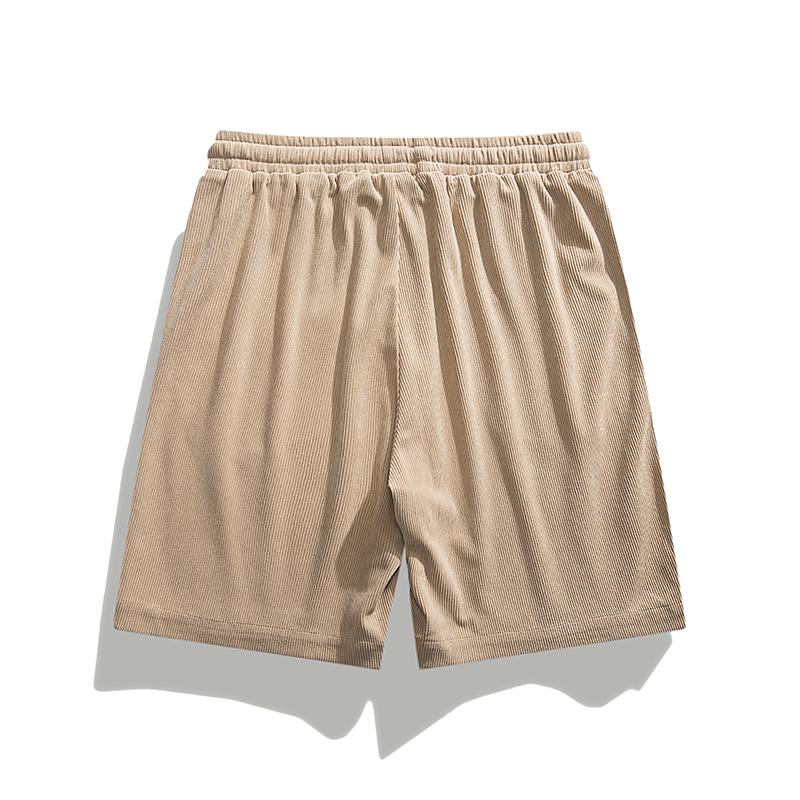 Shorts décontractés polyvalents et amples à taille ajustable avec une sensation de fraîcheur tendance.