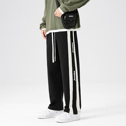 Pantalon de survêtement ample et ajusté en tricot droit style hip-hop.