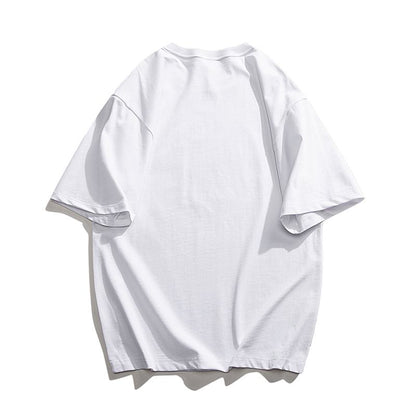 Camiseta de manga corta con cuello redondo y estampado de letras, de hombros caídos y versátil.
