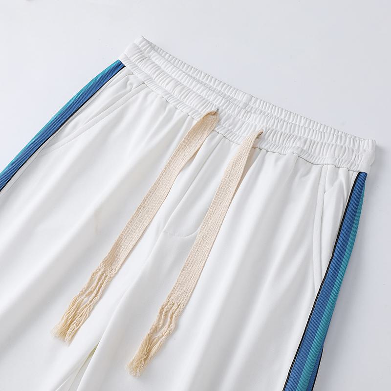 Pantalón deportivo versátil recto de moda con cintura elástica y ajuste holgado.
