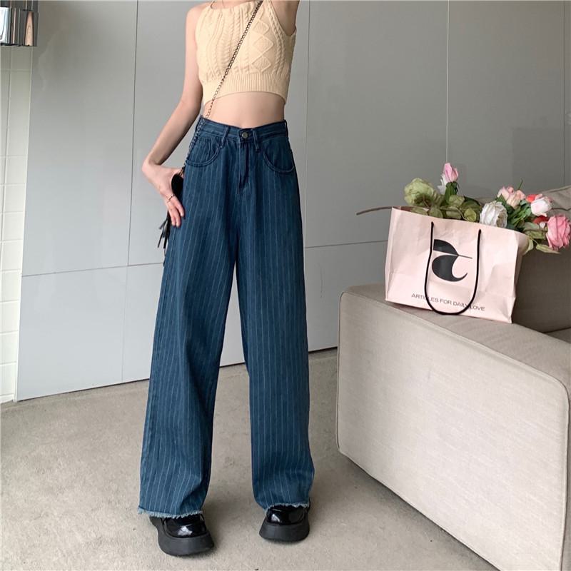 Pantalon rétro à taille haute et jambes larges, ample et doté de poches droites, idéal pour le travail et affinant la silhouette.