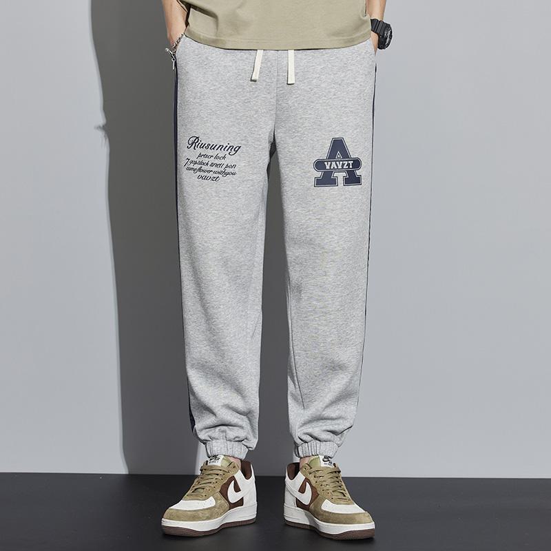 Pantalon de survêtement patchwork tricoté polyvalent avec lettres.