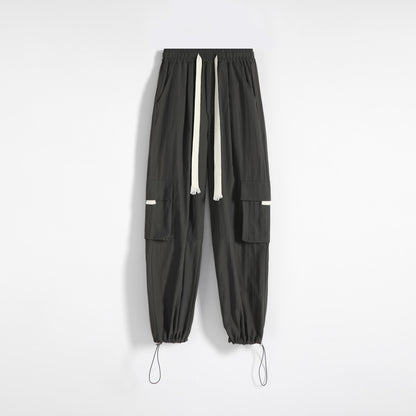 Pantalon cargo ample décontracté en soie, à taille haute et à séchage rapide avec plusieurs poches.