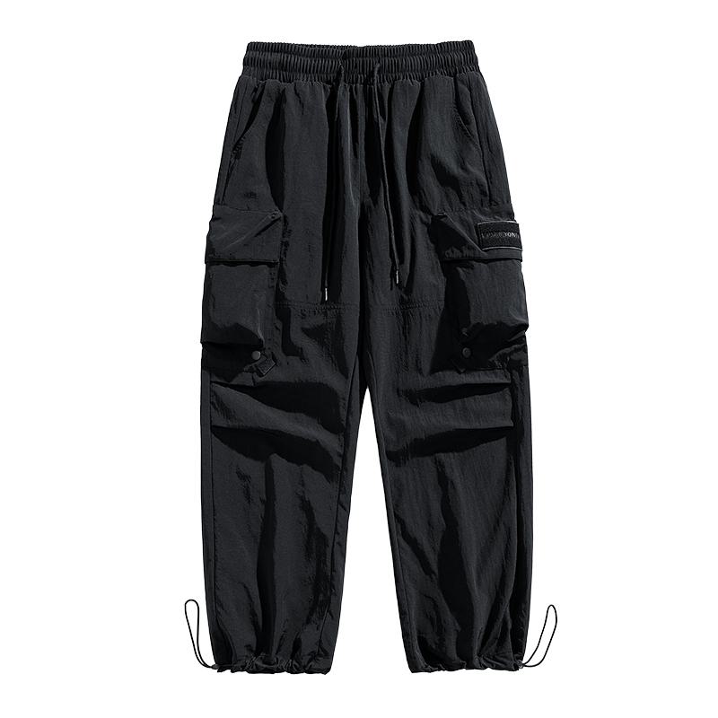 Pantalon cargo polyvalent imperméable à jambes droites larges et élastiques avec poches tendance.