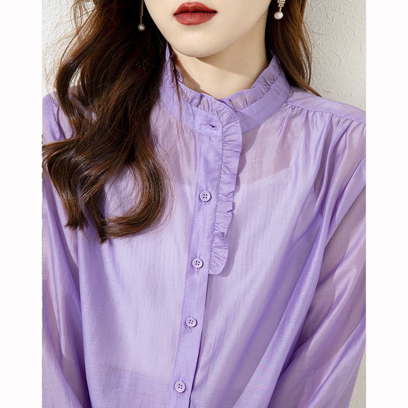 Blusa morada de estilo francés con mangas de linterna finas