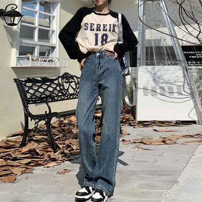 Lässige, bodenlange gerade High-Street-Style Jeans mit hoher Taille und weitem Beinschnitt im Retro-Look.
