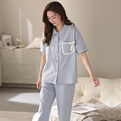 Pyjama-Set aus reiner Baumwolle in einfarbiger Ausführung mit Knopfleiste, Brusttasche und Lycra-Kragen