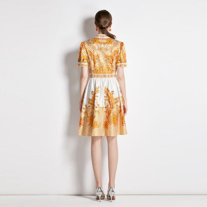 Leichtes, elastisches Print-Kleid im französischen Stil mit weitem Rock und V-Ausschnitt.