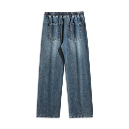 Jeans elásticos de corte recto, modernos y versátiles con cintura elástica, ajuste holgado y lavado desgastado.