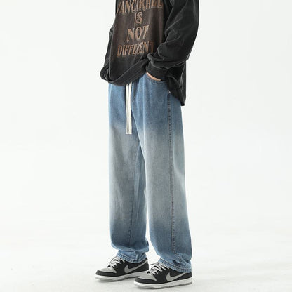 جينز مستقيم فضفاض بخصر مرن ورباط بألوان تدرجية.