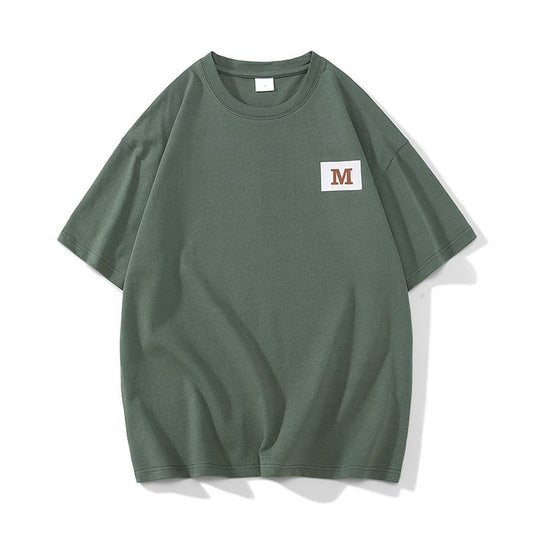 Cómoda, moderna y versátil camiseta de manga corta de algodón puro con cuello redondo y estampado.