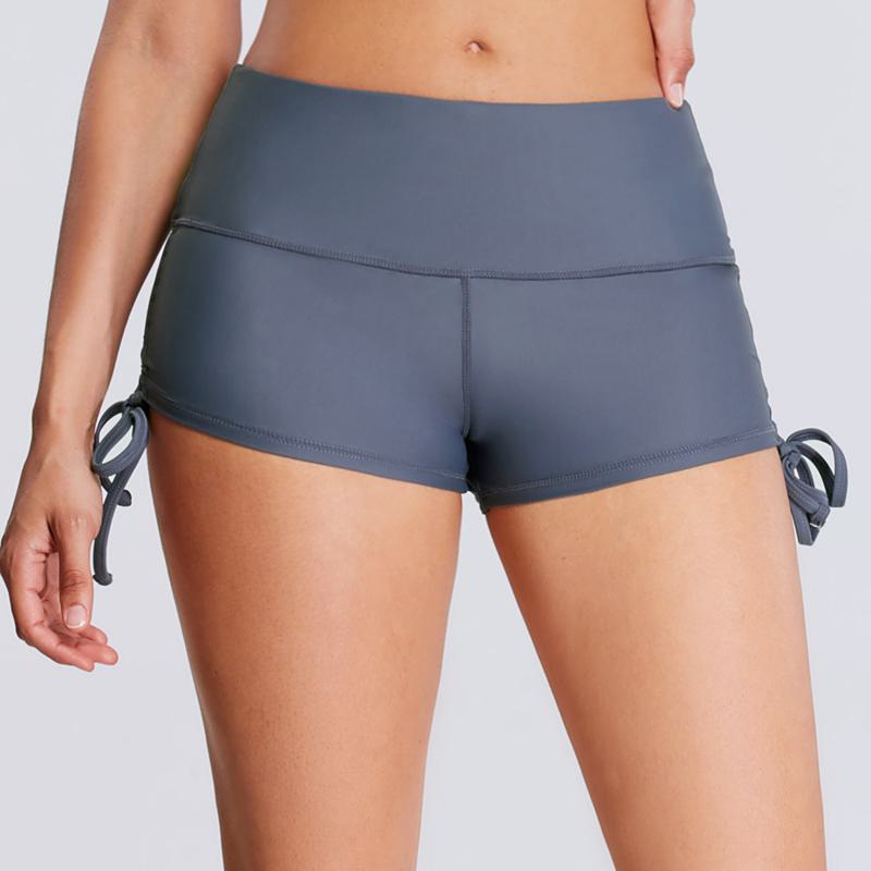 Pantalones cortos deportivos de yoga con cintura alta y ajuste ceñido elástico, adecuados para fitness.