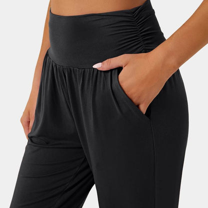 Pantalon de sport plissé décontracté à taille haute avec ceinture ample et poche pour la taille, idéal pour le yoga.