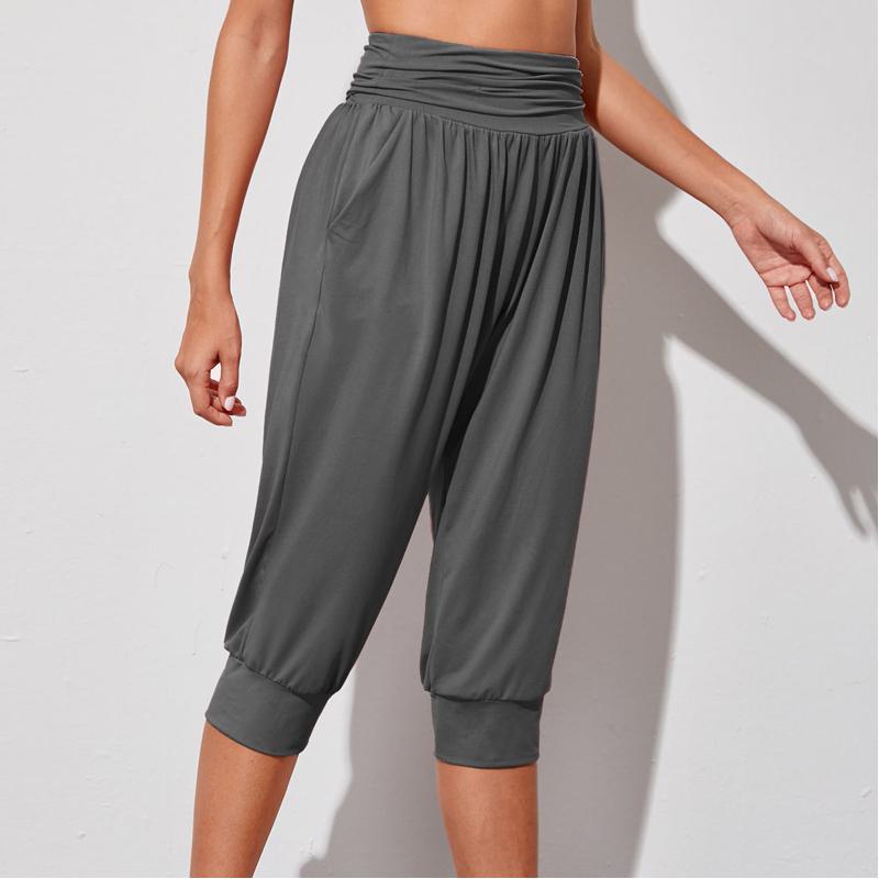 Pantalones deportivos multicolores sueltos de cintura alta con bolsillos para yoga y running.