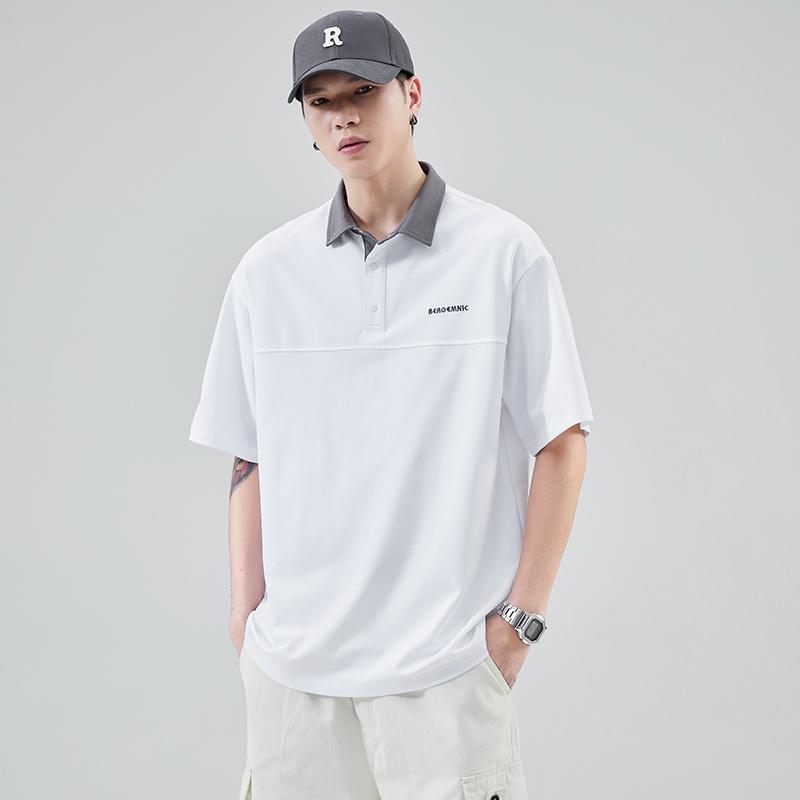 Hochwertiges Polo-Shirt mit kurzen Ärmeln und Seidenkragen, aus reiner Baumwolle mit glänzendem Seidenglanz und schlichter Perlenstickerei