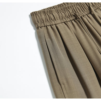 Pantalones cortos de seda helada de color sólido con cintura alta, pierna ancha y corte suelto con cordón.