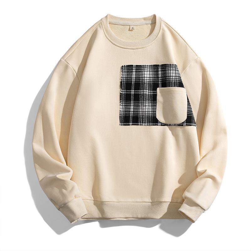 Trendiger Sweatshirt mit Rundhalsausschnitt, überschnittenen Schultern und aufgesetzten Taschen im Patchwork-Stil