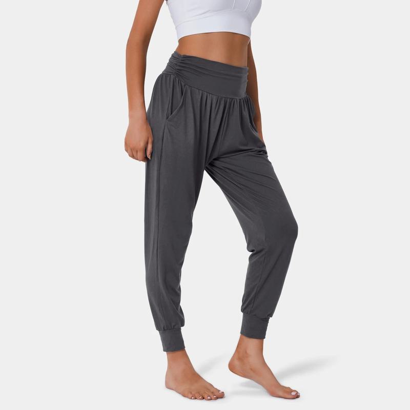 Pantalon de sport décontracté à taille haute, poches, coupe ample, cordon de serrage et plis pour le yoga.