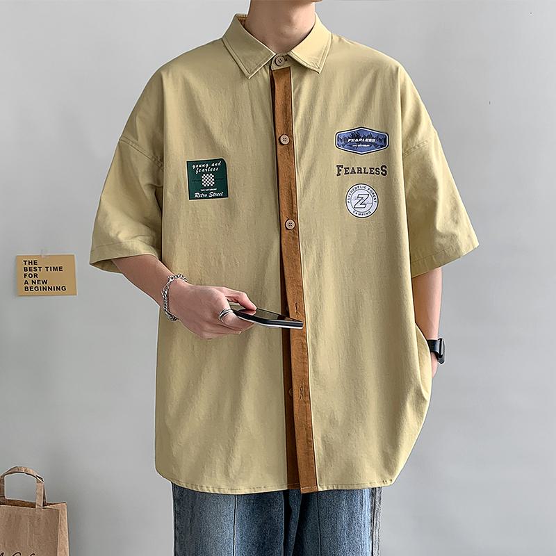 Camisa de manga corta versátil con estampado de bloques de color de moda para el trabajo