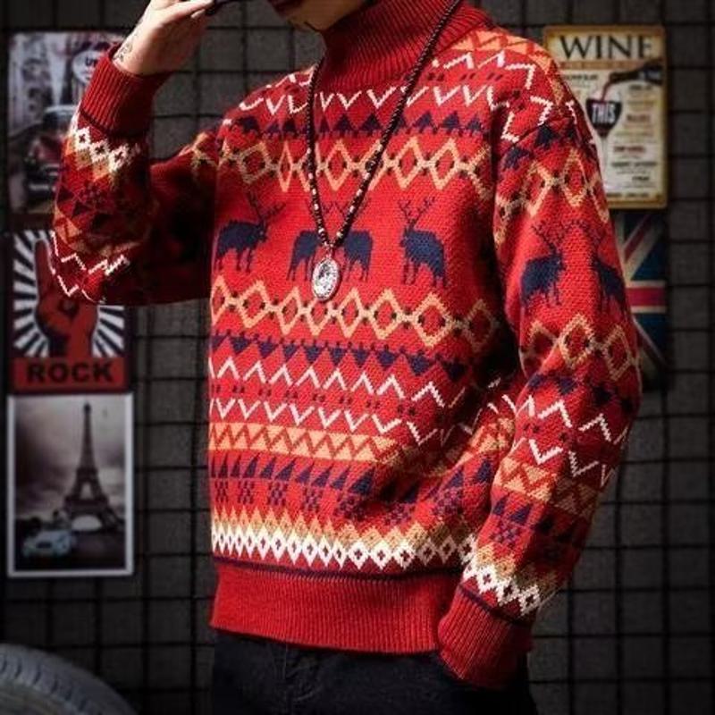 Suéter de punto recto con cuello medio alto de moda en rojo con renos y tejido grueso.