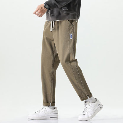Pantalones deportivos casuales de ajuste holgado y corte cónico reforzados