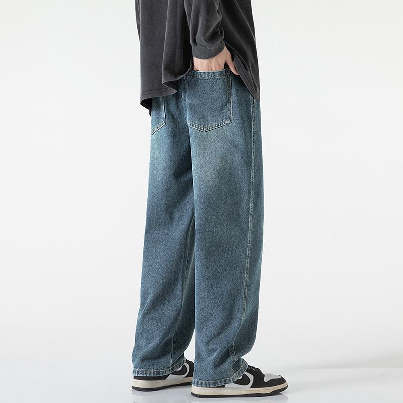 Jeans retro elásticos de talle alto hasta el suelo, lavados, sueltos y rectos.