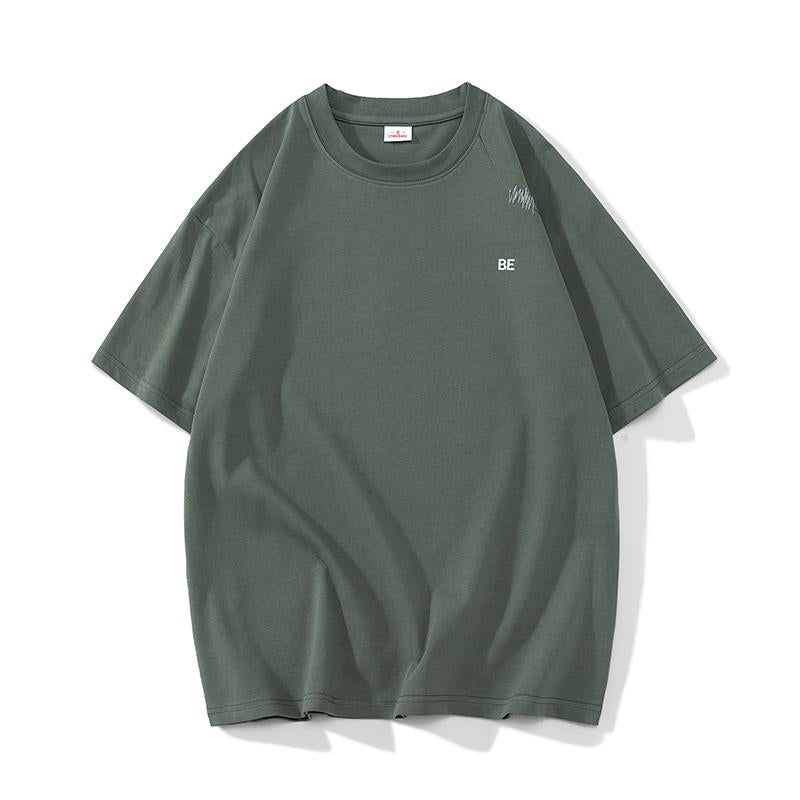 Lässiges T-Shirt mit Rundhalsausschnitt aus reiner Baumwolle, überschnittener Schulter und lockerer Passform.